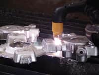 image of hand held cast trimming
