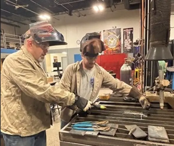Art_Boilermaker_Jason and apprentice_590x494.jpg