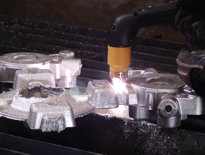 image of hand held cast trimming