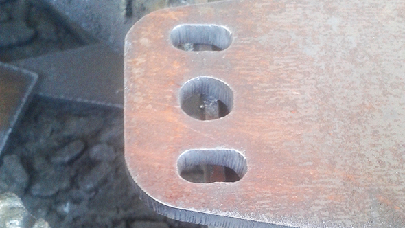 Improvement in hole and slot cut quality