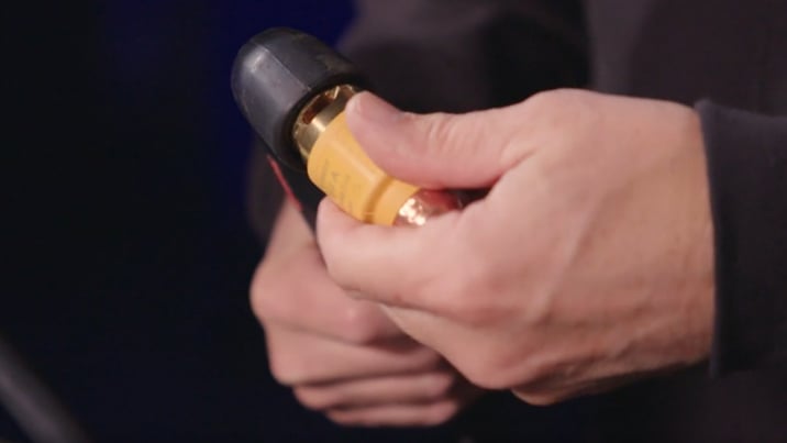 Someone changing a cartridge consumable
